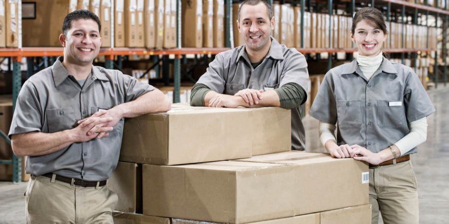 uniformed-warehouse-workers-surrounded-by-boxed-pr-2022-03-04-02-39-12-utc (1)